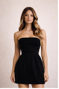 Black Noir Muse dress by Trendsi, featuring a stylish fit and elegant design, shown on a model in this fashion product image.