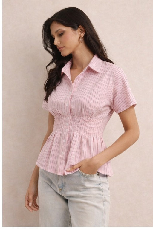 LOROMIA Maison Élitaire shirt displayed on a hanger with a classic collar and button-down front, in a neutral fabric.